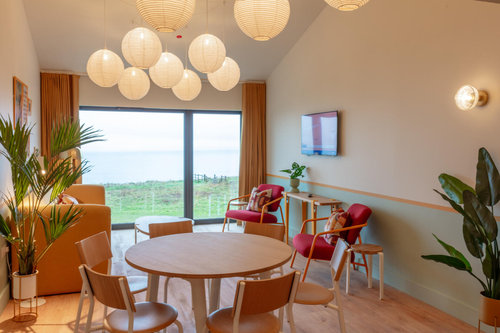 Large studio living room area looking out to sea