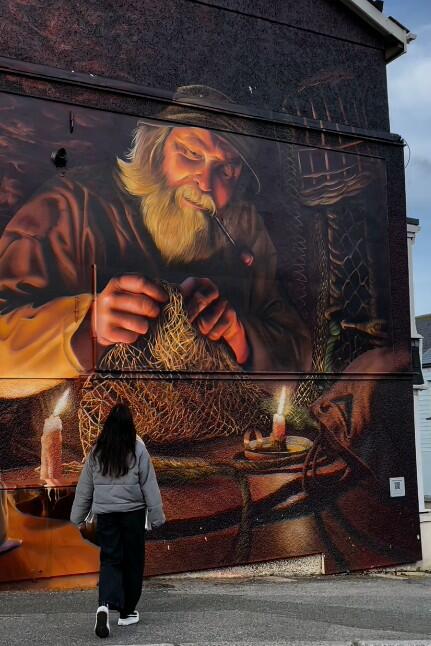 Fisherman weaving baskets mural, Newquay