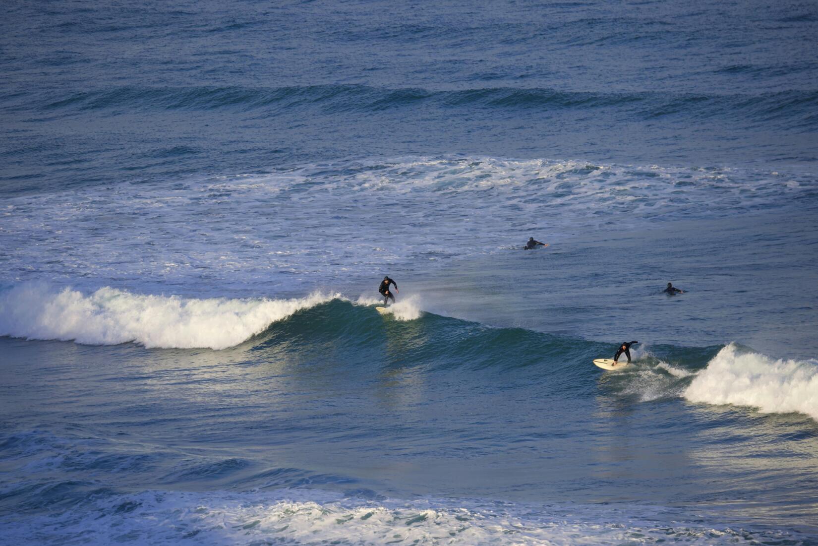 Surfers in Cornwall