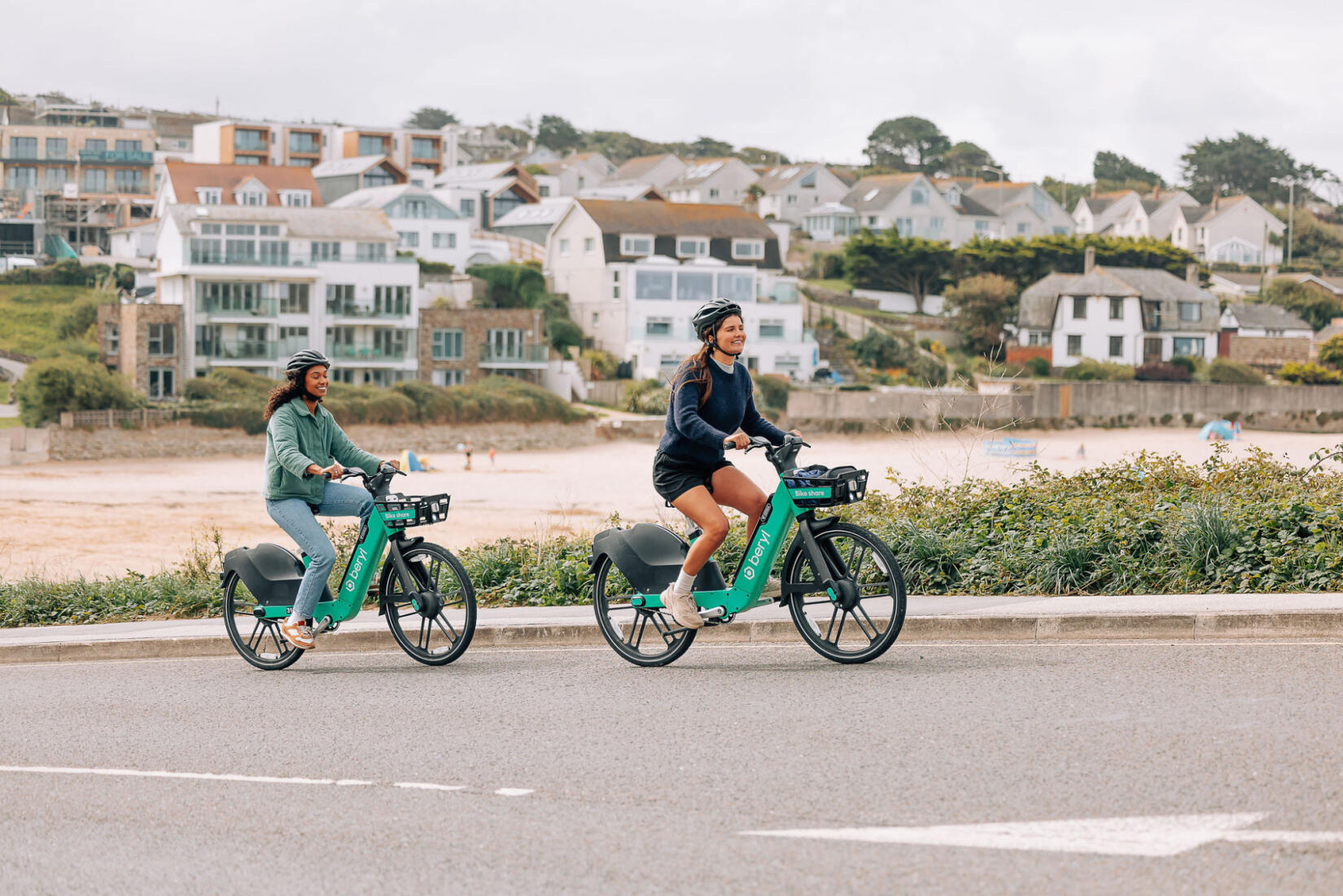 Two women using Beryl Bikes to get around Newquay