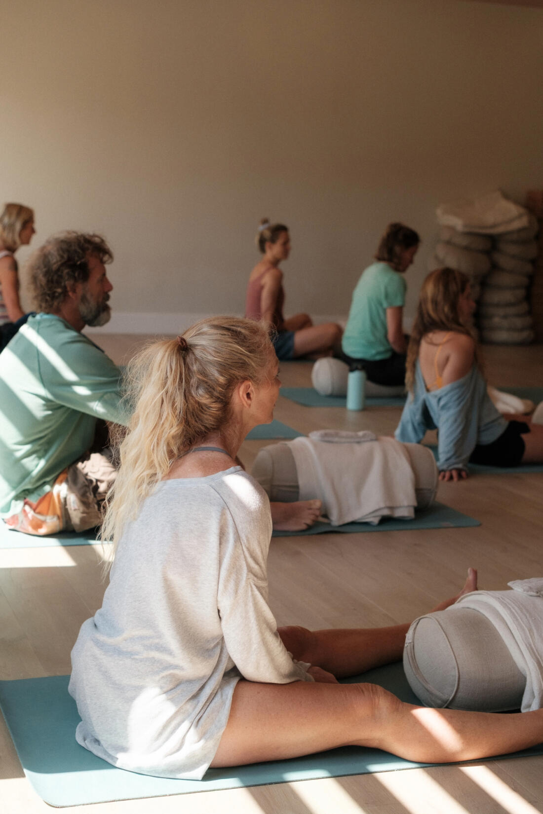 People taking a breathwork class in the studio at SeaSpace