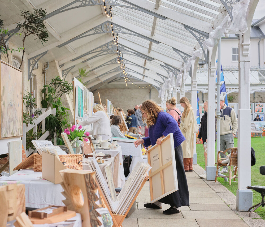 People walking around FORM art festival in Falmouth