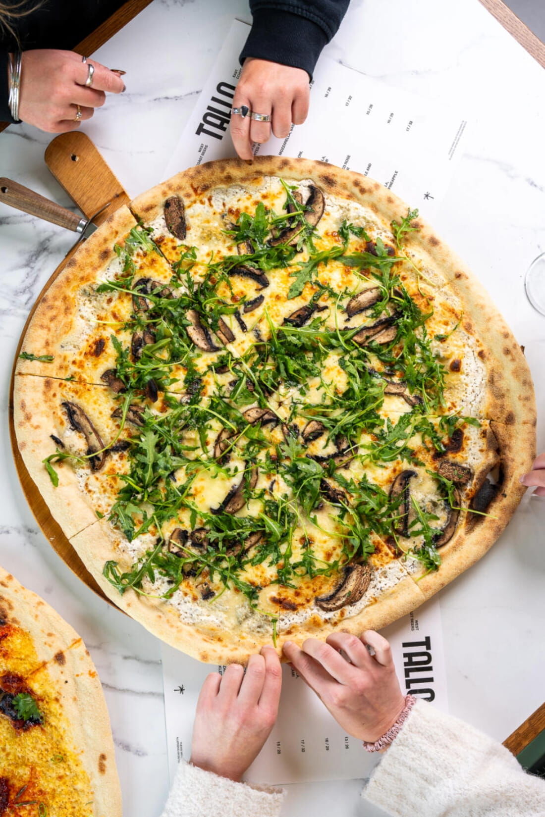20 inch pizza being shared at Tallo in newquay